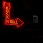 neon signage in a bar